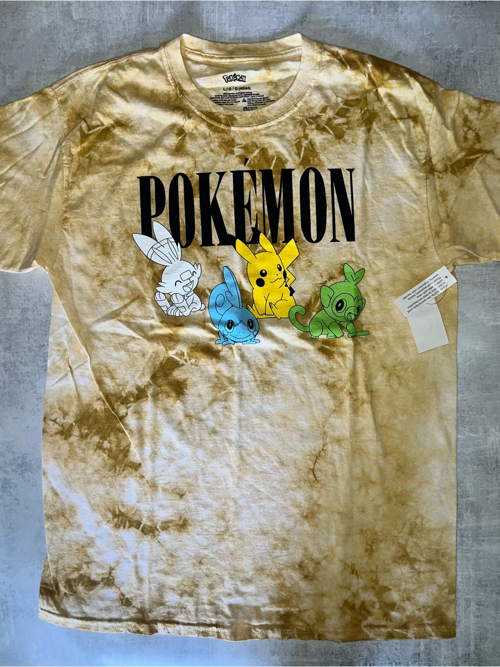Official Pokémon gold/brown tie-dye graphic t-shirt featuring Pikachu size L